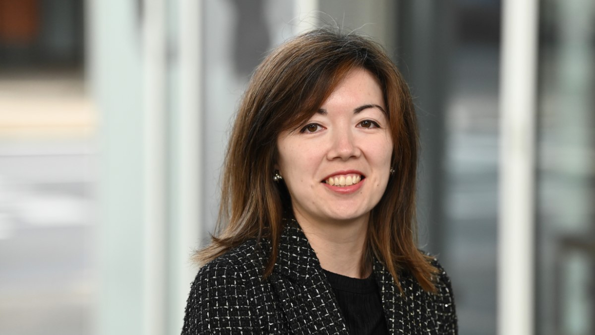 dark haired woman smiling